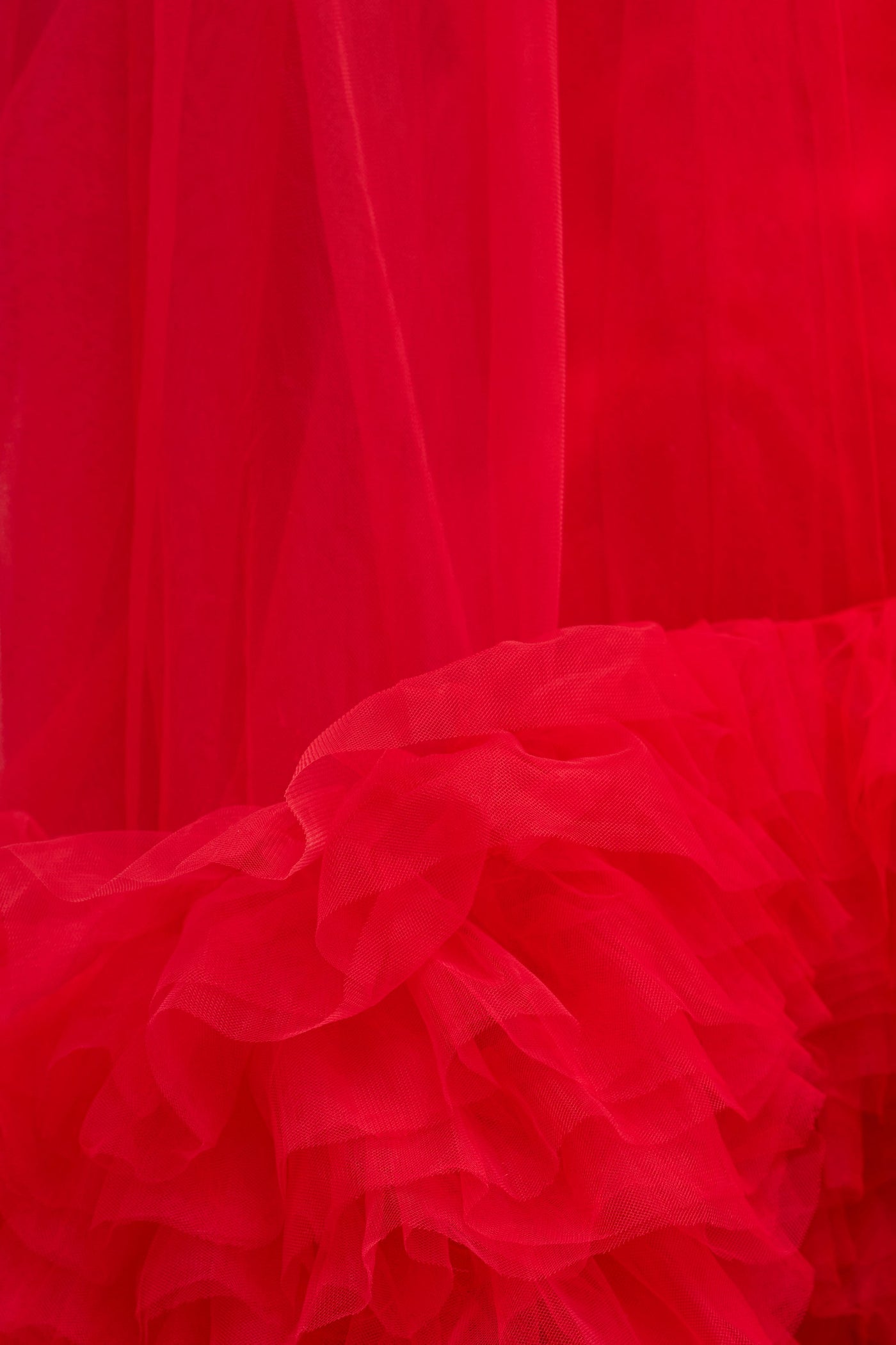 ARI TULLE RUFFLE HIGH LOW MINI DRESS IN RED