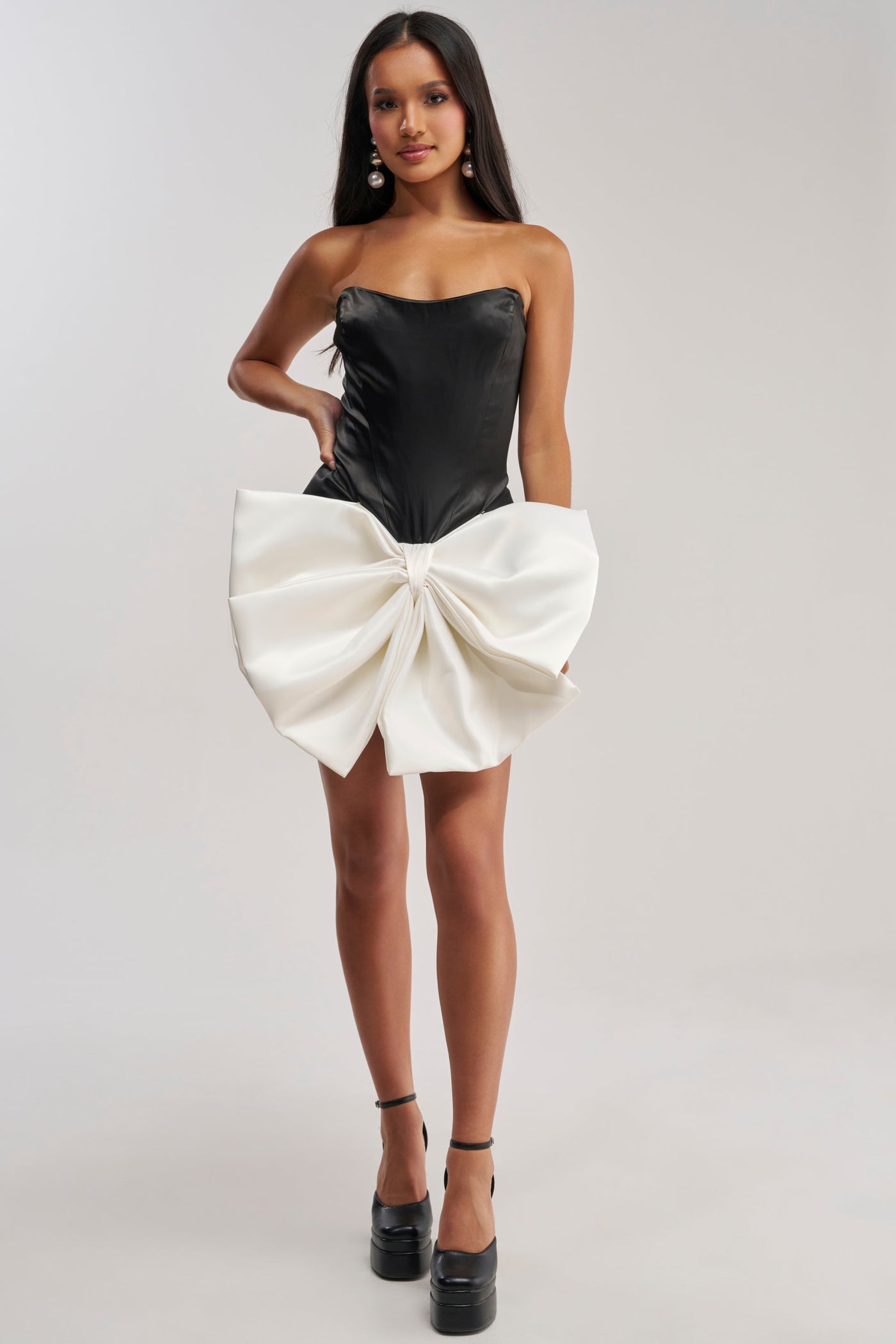 SITTING PRETTY BOW MINI DRESS