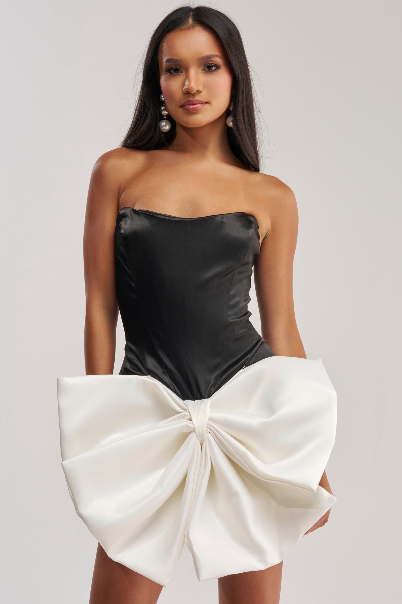 SITTING PRETTY BOW MINI DRESS