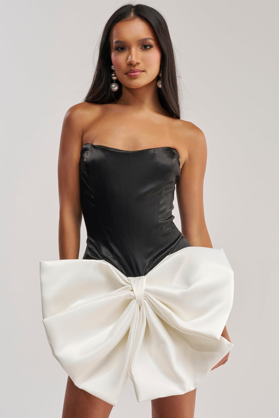 SITTING PRETTY BOW MINI DRESS