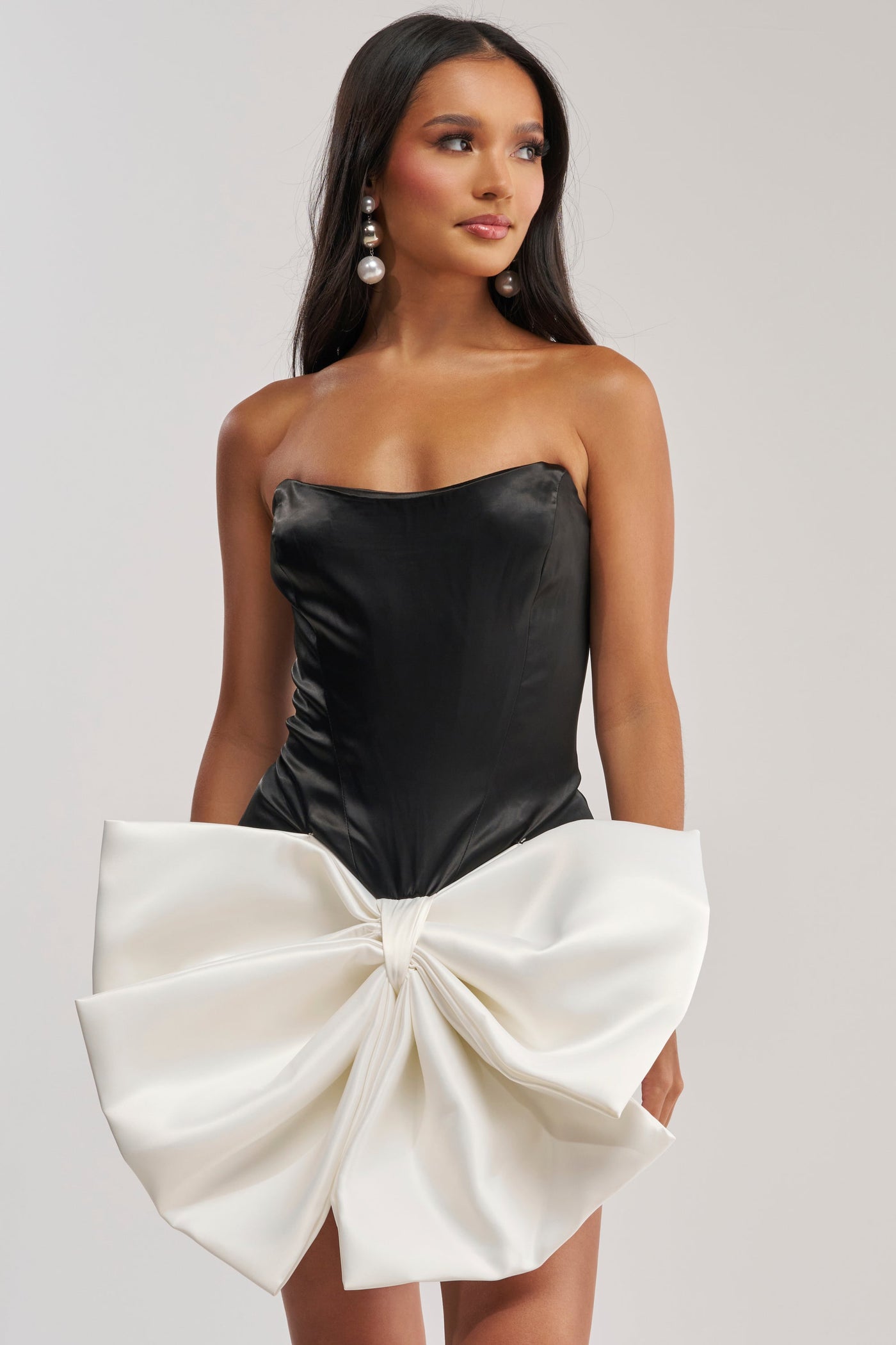SITTING PRETTY BOW MINI DRESS