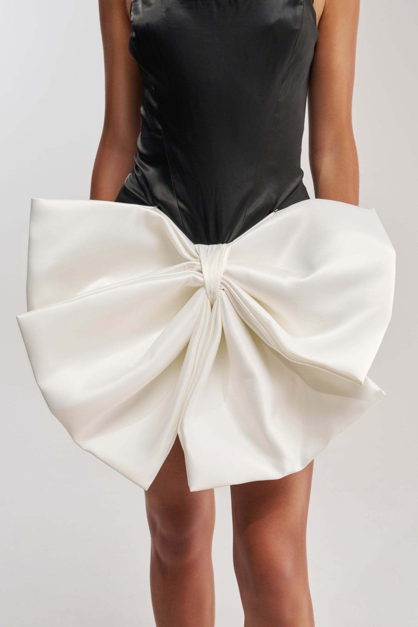 SITTING PRETTY BOW MINI DRESS