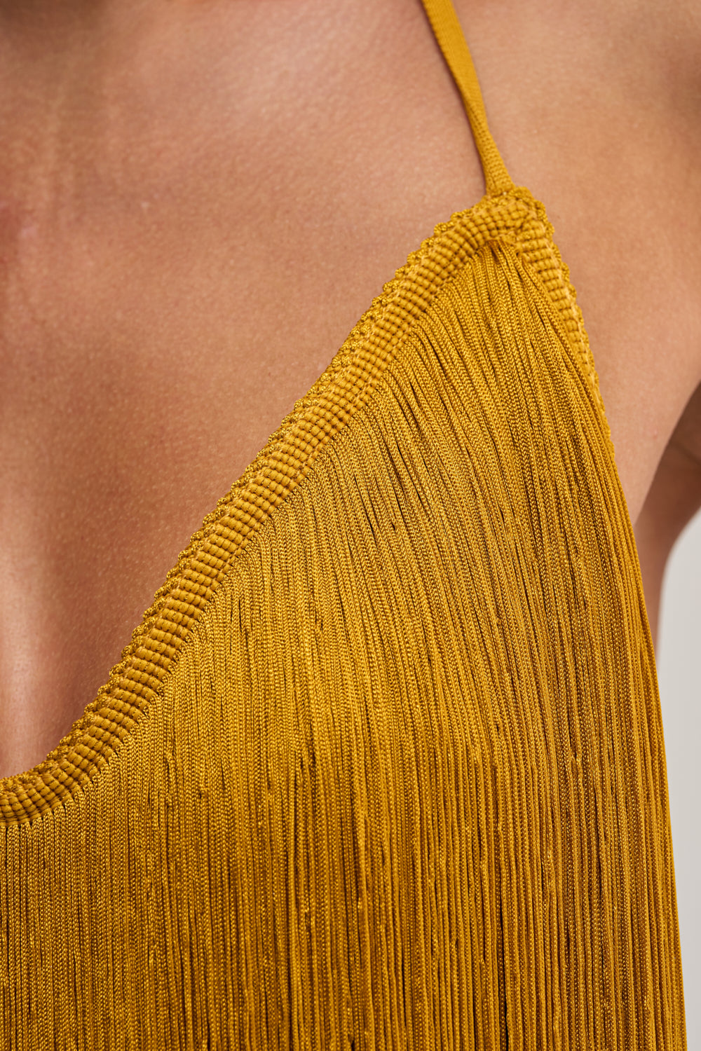 DRINKS ON ME FRINGE MINI DRESS IN GOLD