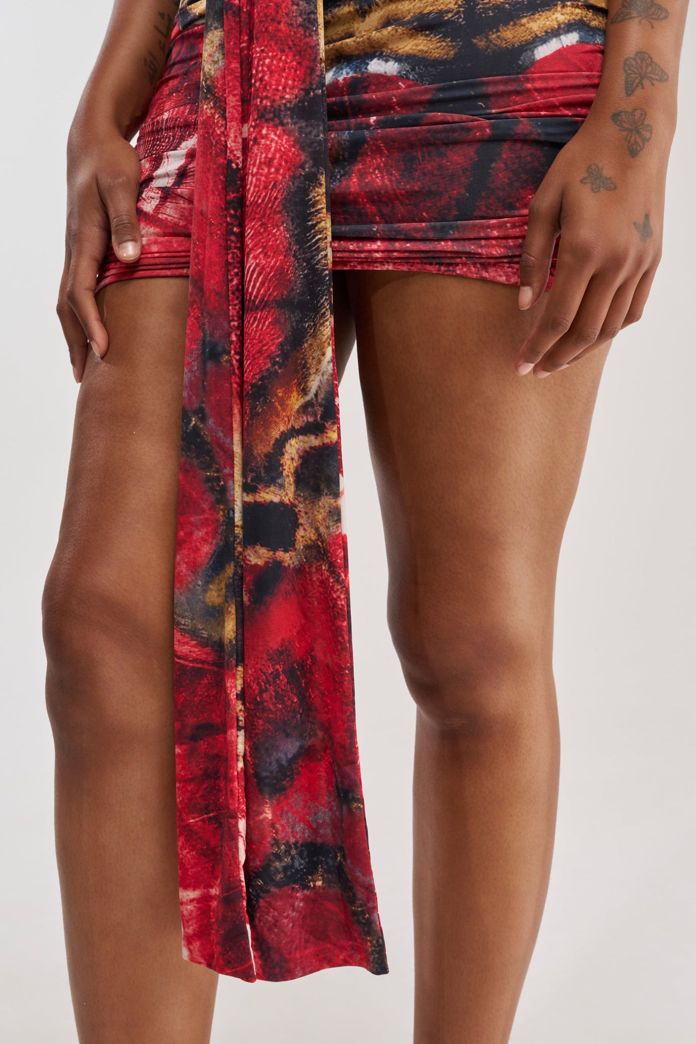 I DARE YOU PLUNGING MINI DRESS IN RED MULTI