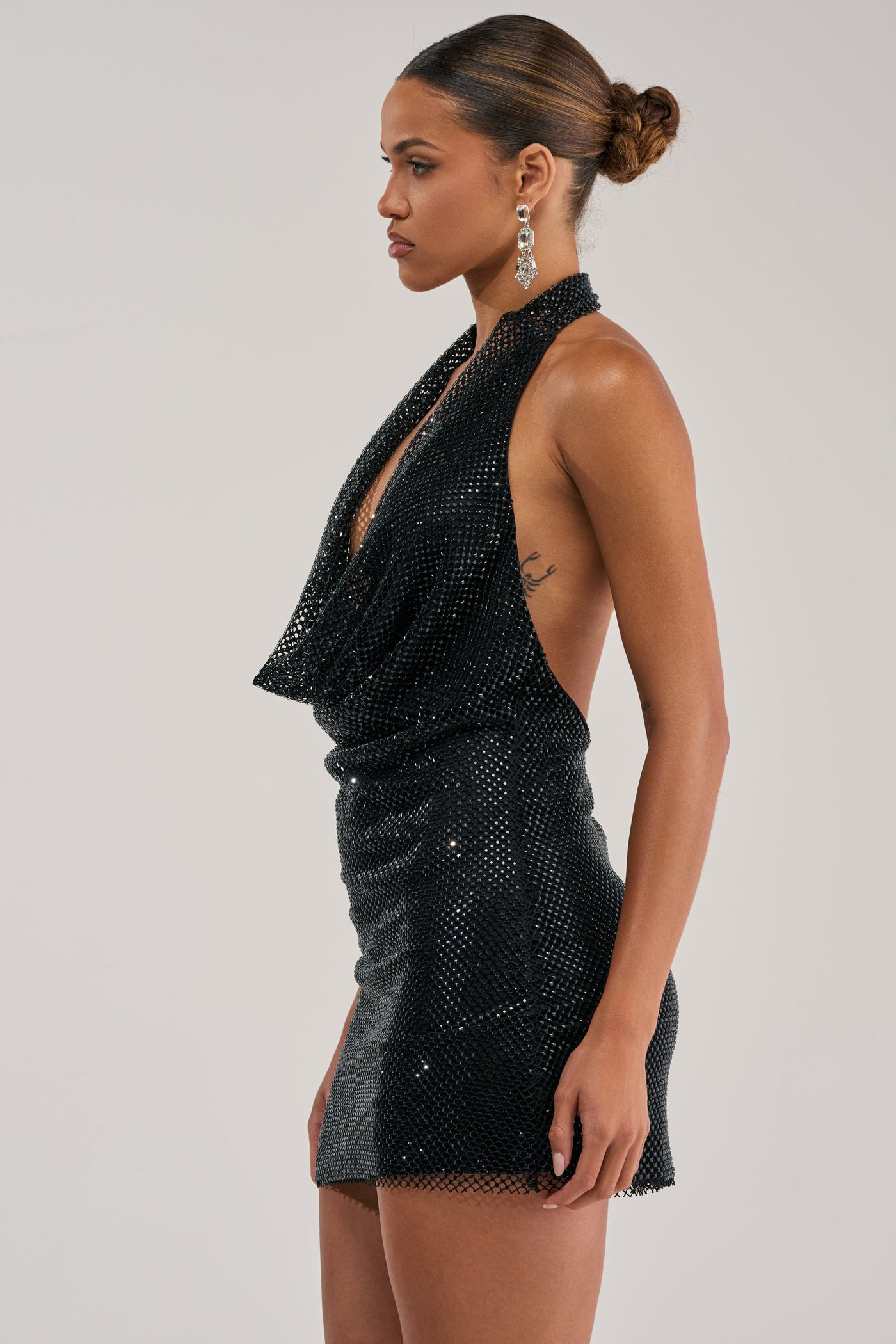 THE GLOW UP HALTER RHINESTONE MINI DRESS IN BLACK